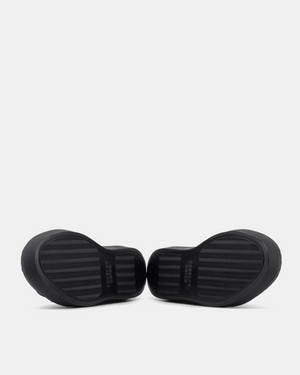 Navy Dress Sneaker in Black Soles