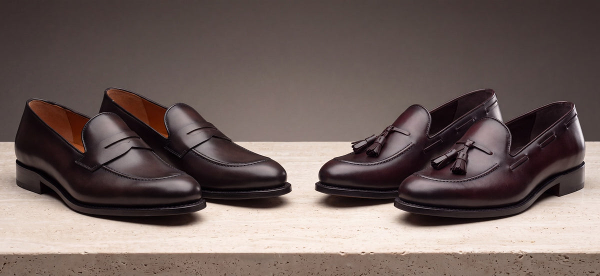 Dark brown penny loafers beside oxblood tassel loafers
