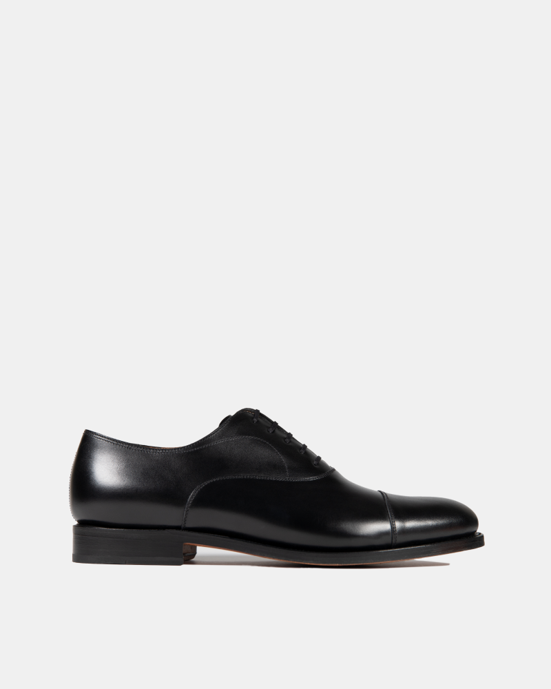 Black dress shoes with white soles shop