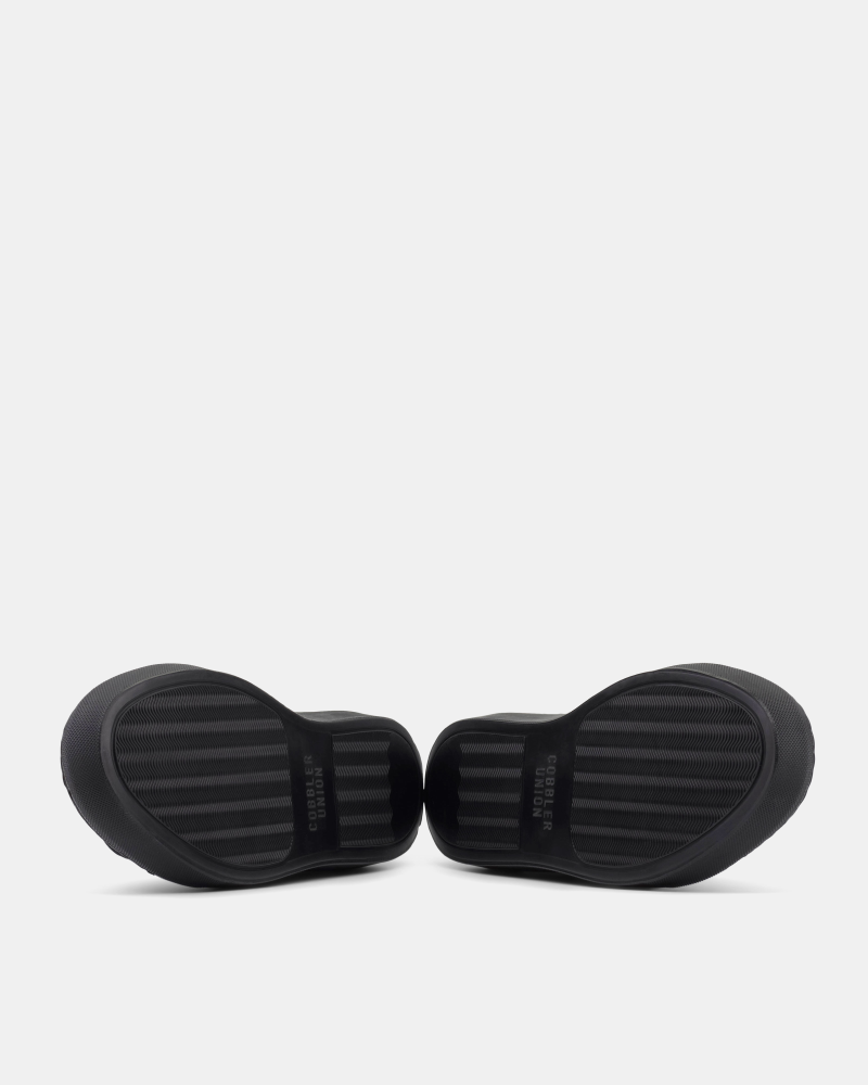 Navy Dress Sneaker in Black Soles